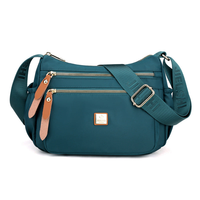 Multi-compartment shoulder bag