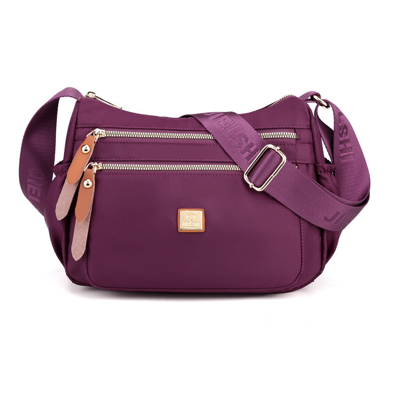 Multi-compartment shoulder bag