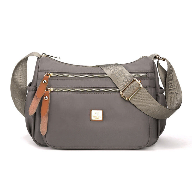 Multi-compartment shoulder bag