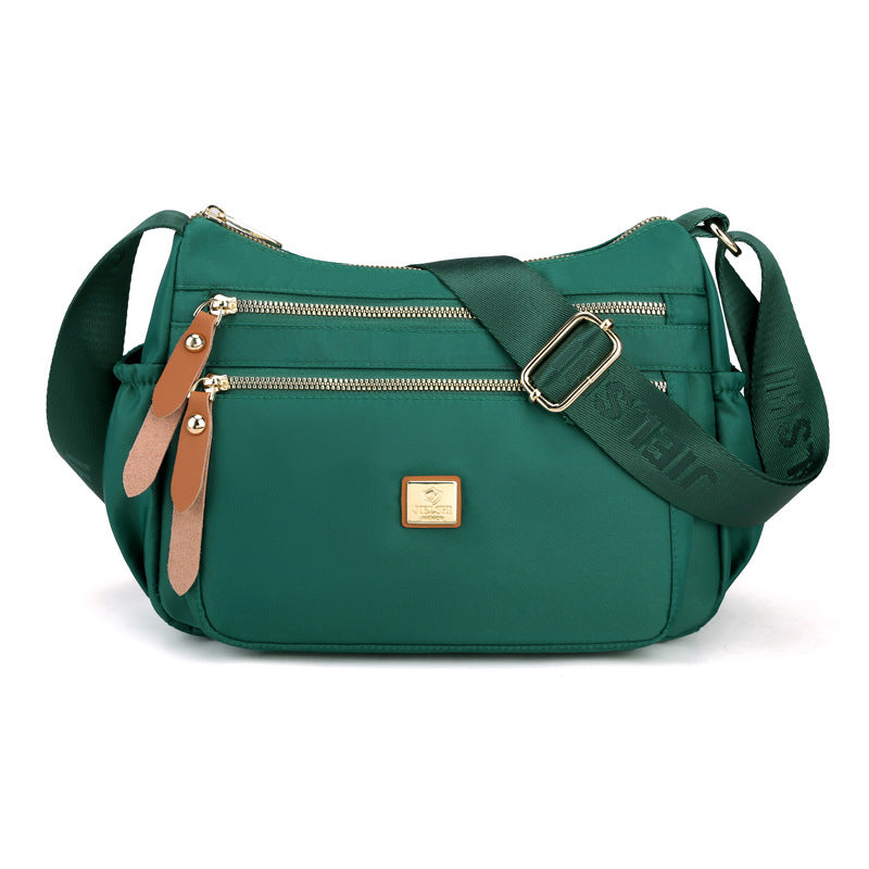 Multi-compartment shoulder bag